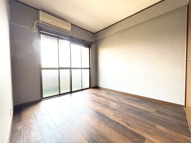 新栄プロパティー羽曳が丘の寝室