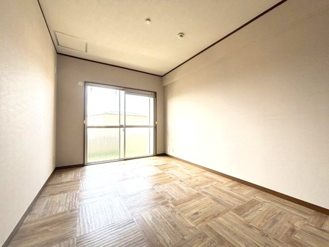 新栄プロパティー羽曳が丘の洋室
