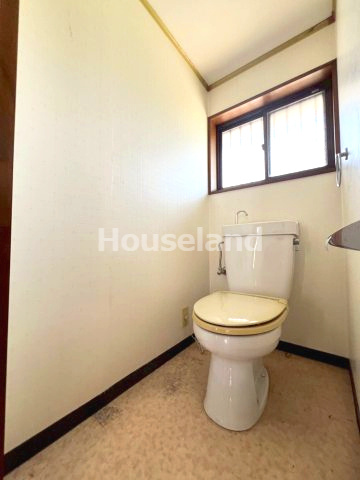 六十谷戸建　のトイレ