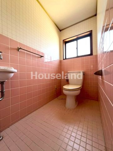 六十谷戸建　のトイレ