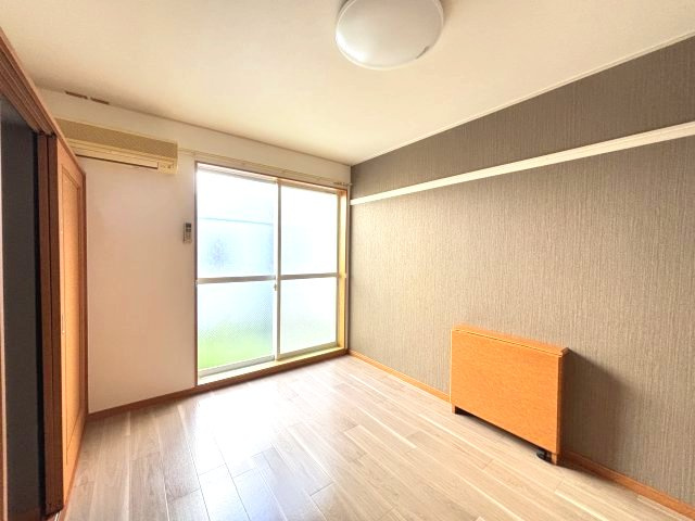 スタンドアップ錦町の洋室