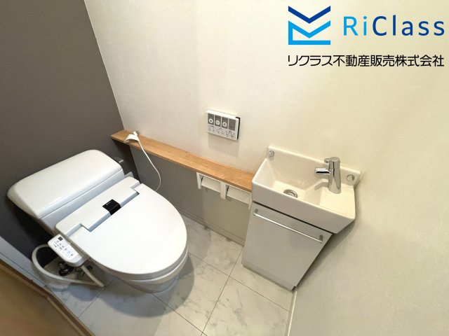 中古戸建　神戸市須磨区須磨浦通6丁目4-22のトイレ|１階のトイレです