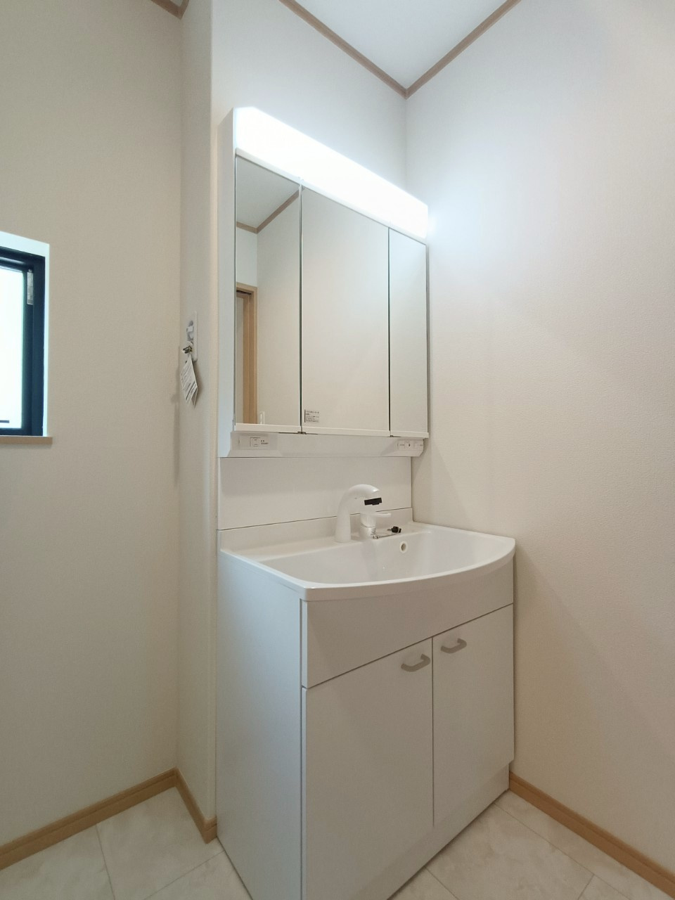 八潮市　緑町3丁目　新築戸建　　全2棟の洗面所|施工例です