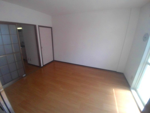 プラザ朝霧の寝室