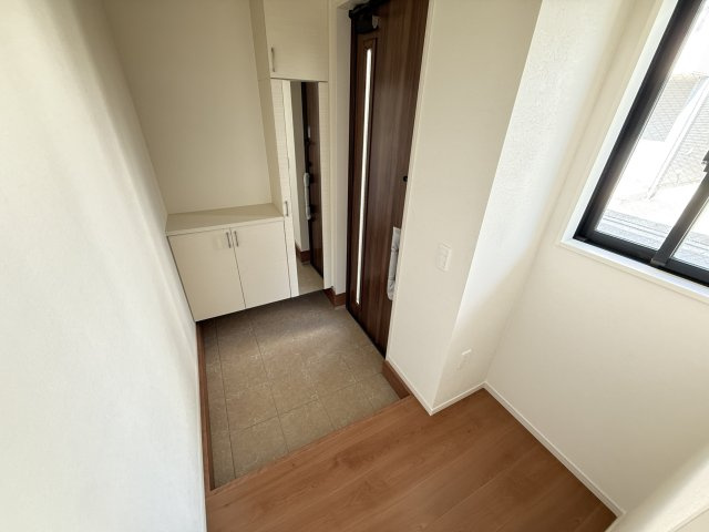 石津町中1期1棟の玄関