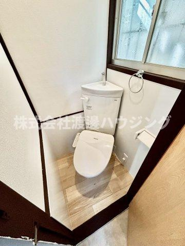 上四条町一戸建のトイレ