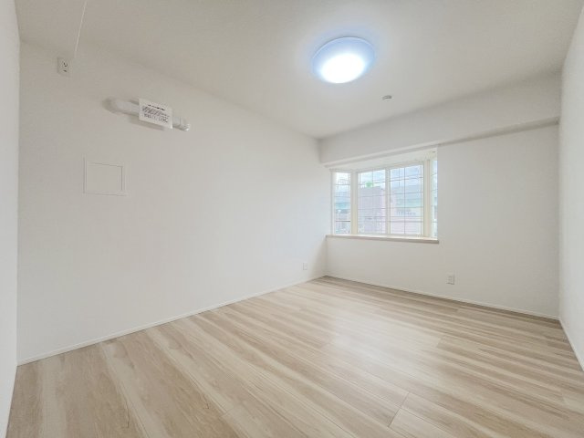 スワンマンション空港南の洋室