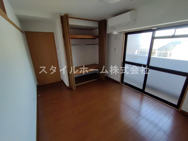 春日グリーンフラッツの寝室