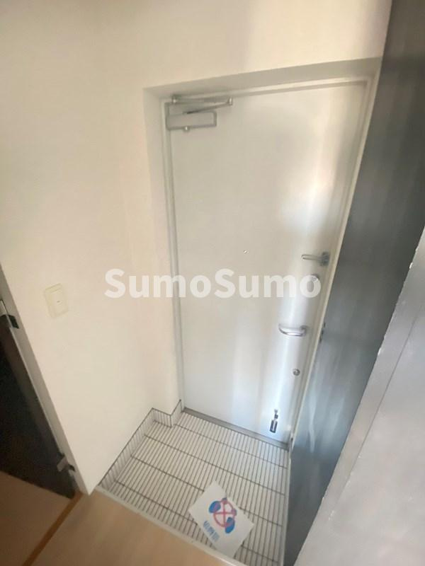 エス・キュート御影の玄関