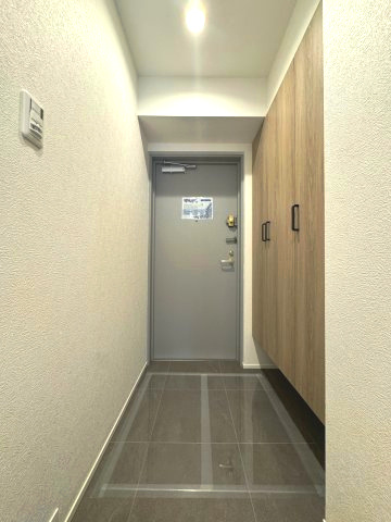 ライオンズマンション保谷の玄関|玄関
白を基調とした落ち着いた玄関です。出かけるときも帰ってきたときも安心できそうな玄関です。