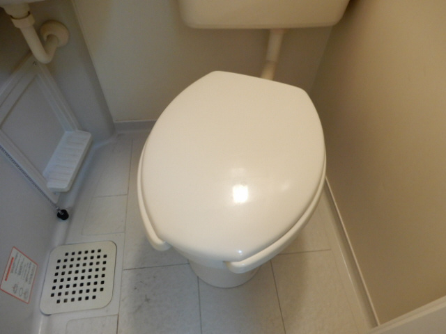 神戸市垂水区平磯４丁目の賃貸マンションのトイレ