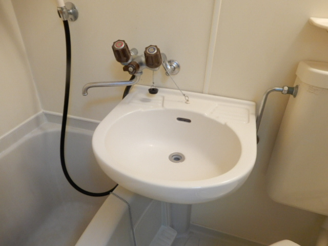 神戸市垂水区平磯４丁目の賃貸マンションの洗面所