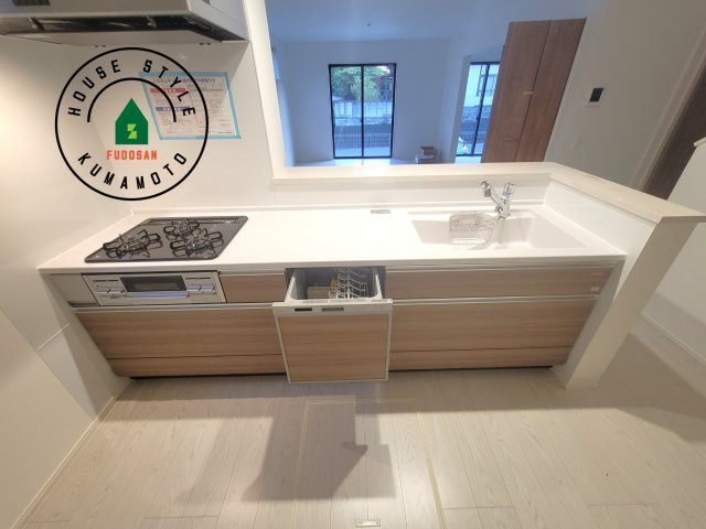 合志市合生第2-2棟（1号棟）　のキッチン|ご家族を近くに感じられる対面キッチンのLDK。会話もはずみそうですね。