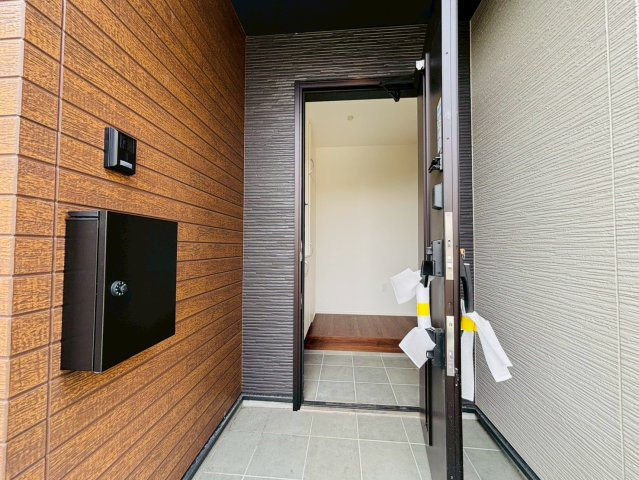 よかタウン／東区新外３丁目／1号棟の玄関