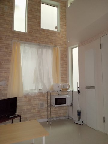 川崎市多摩区布田のアパートの居間・リビング