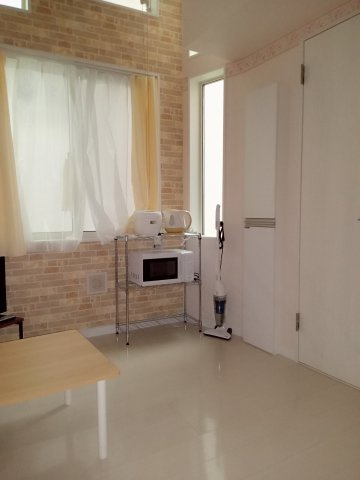 川崎市多摩区布田のアパートの居間・リビング