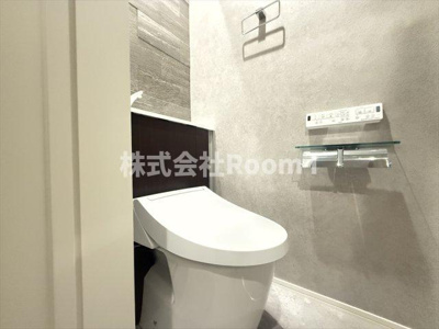 【トイレ】 | 【ペット共生・ZEHマンション】Maison de Mine Nagai Parc Est.・旭化成ヘーベルメゾンHEBEL HAUS | 落ち着いた色調のトイレです