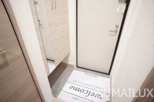 アクアフェリーチェB棟の玄関