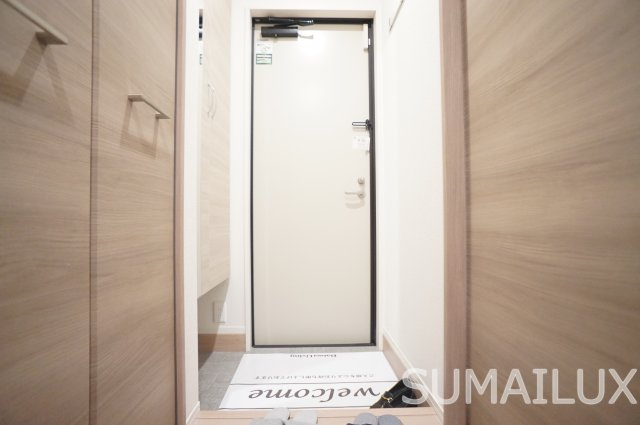 アクアフェリーチェB棟の玄関