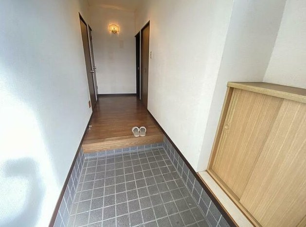 茂原市千町　平家中古戸建の玄関|敷地約117坪　家庭菜園・ドックラン・バーベキュー可能です。閑静な分譲地内 ２LDK平家角地