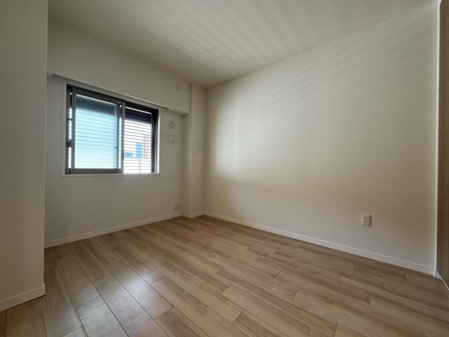 ジオ千里中央ライズコート　E棟の寝室