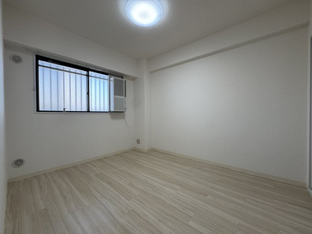 サンフラッツ南桜塚の寝室