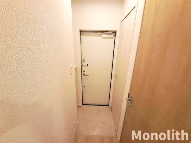 アイマコート初芝の玄関