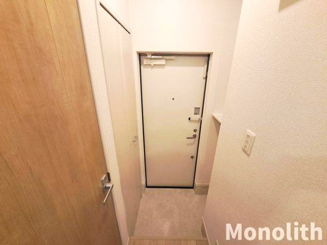 アイマコート初芝の玄関