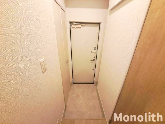 アイマコート初芝の玄関