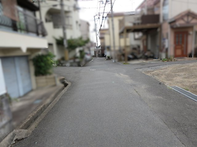 売土地　大東市南津の辺町1号地（建築条件無し更地）の前面道路含む現地写真