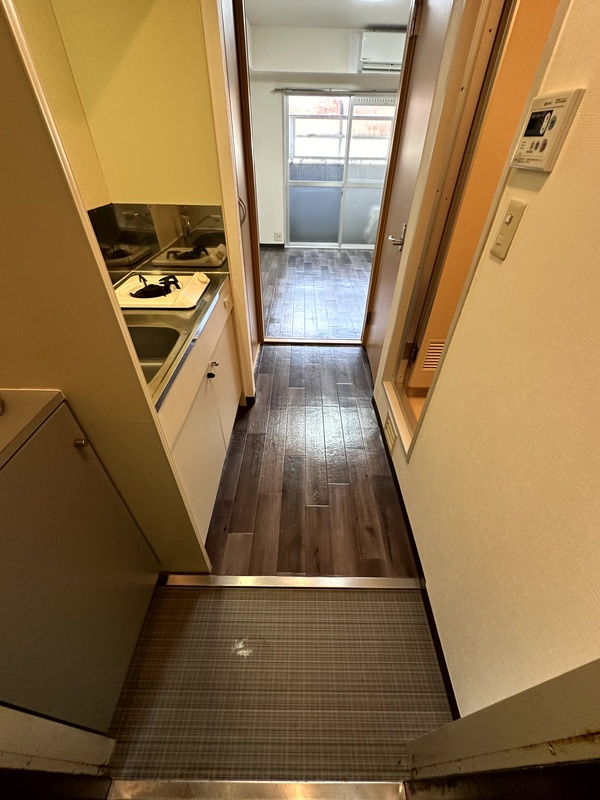 ロータリーマンション上新庄 の玄関