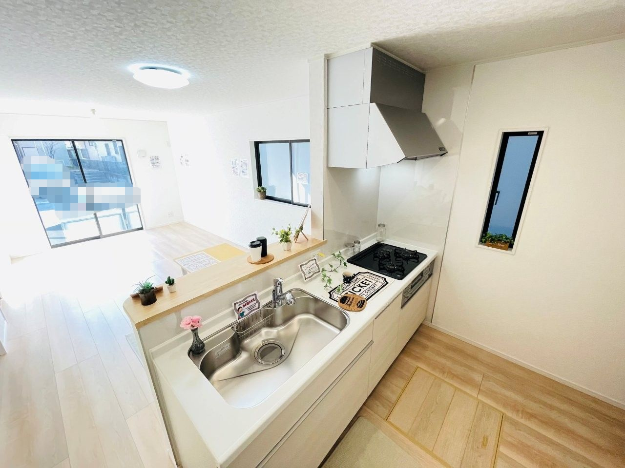 豊田市上丘町第1　新築分譲住宅　全3棟　1号棟のキッチン|浄水器一体型水栓です。