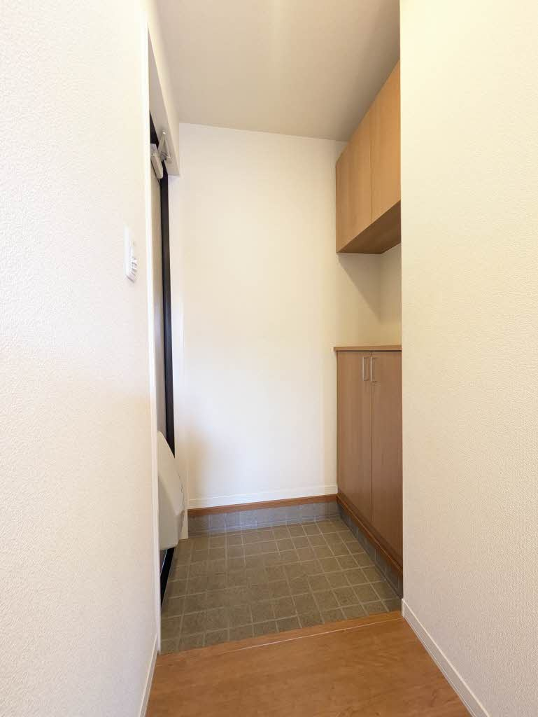 ヴィラーチェH&K A棟の玄関