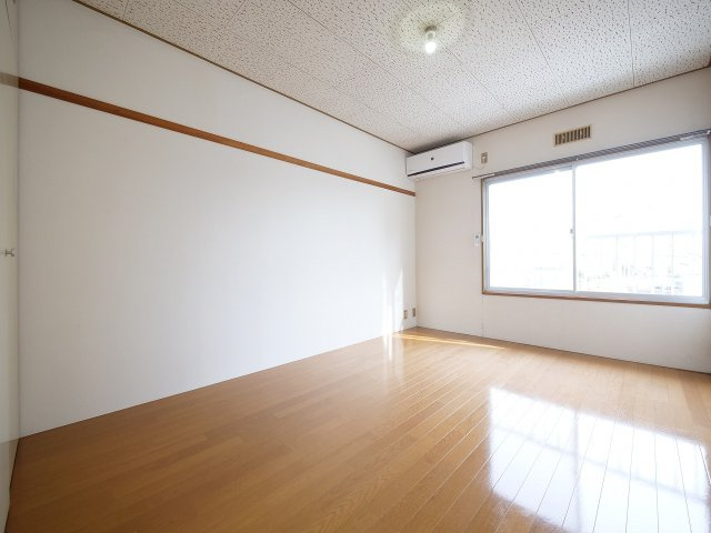 佐藤コーポの居間・リビング|※写真は別の部屋のものです。