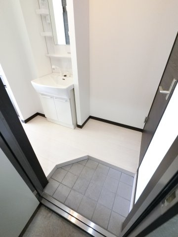 寿マンションの玄関