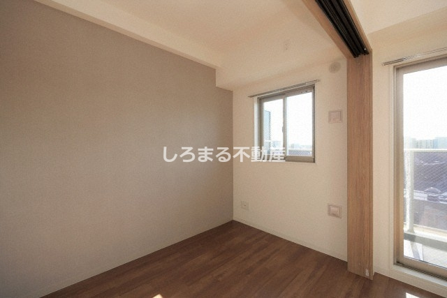 プレサンスＮＥＯ九条ディアシスの洋室