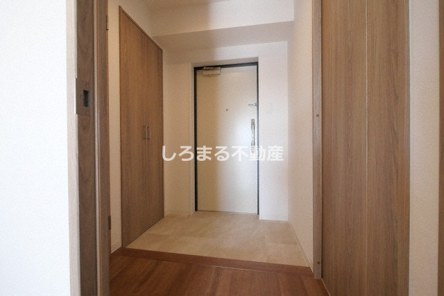 プレサンスＮＥＯ九条ディアシスの玄関