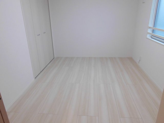 クレール林崎の寝室