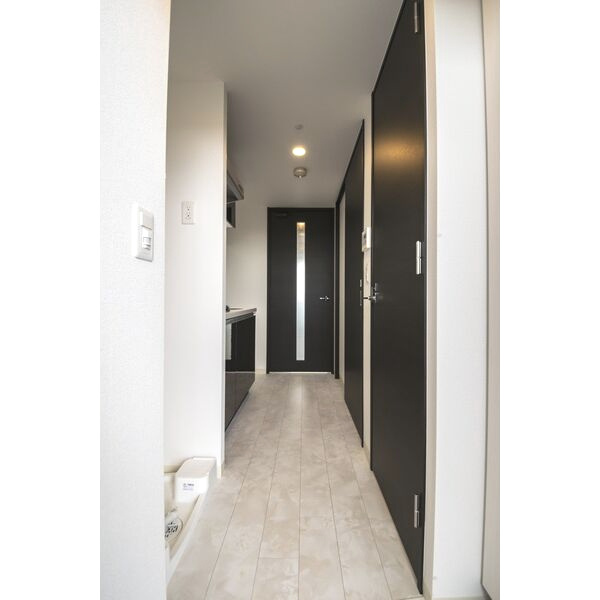 エステムコート新大阪ⅩⅤフロウの玄関