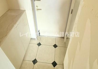 ライオンズプラザ竹の塚の玄関