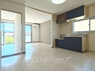 広島市安佐北区口田南１丁目のアパートの居間・リビング