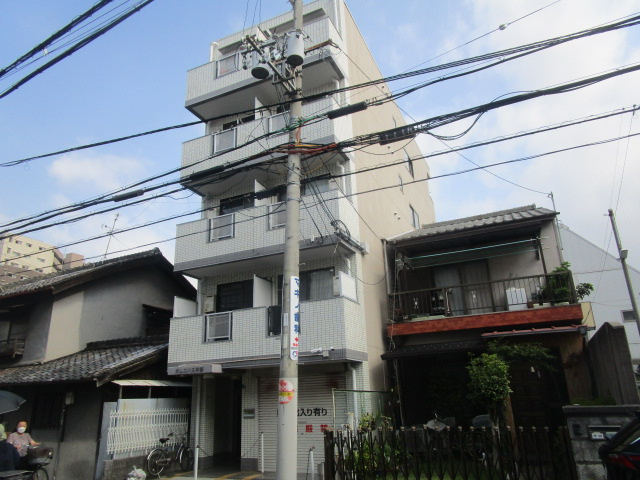 大阪市平野区平野本町２丁目の店付住宅の外観