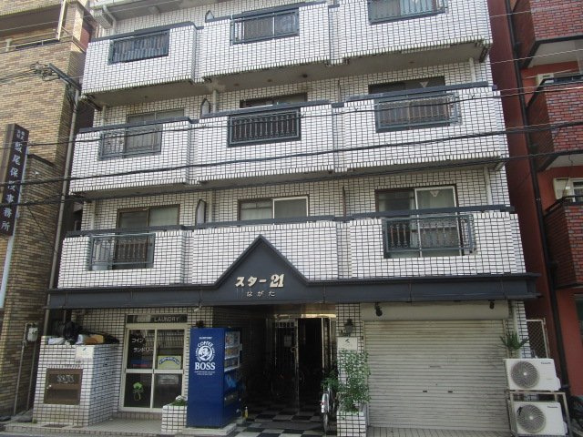 大阪市城東区永田４丁目の店付住宅の外観