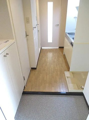 大東市寺川2丁目　学生需要が見込める立地　一棟売マンションの玄関