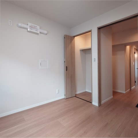 富岡シーサイドコーポＭ棟の洋室