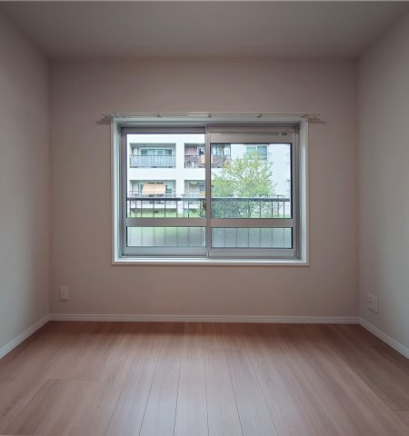 富岡シーサイドコーポＭ棟の洋室