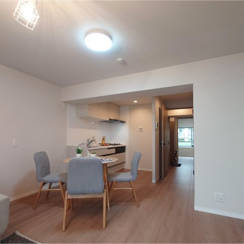 富岡シーサイドコーポＭ棟の居間・リビング