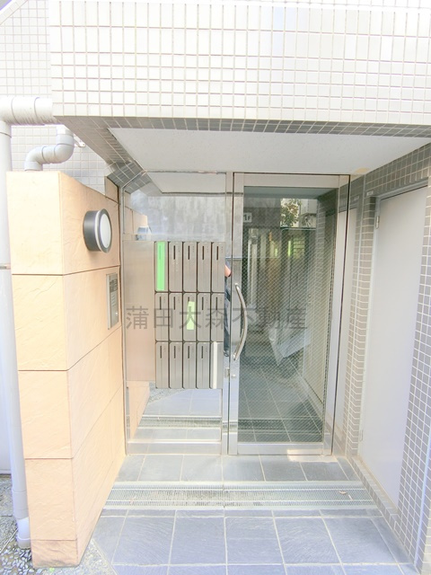 ドルチェ池上のエントランス|オートロック付きのエントランス