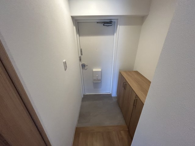 サンクレール本多聞の玄関