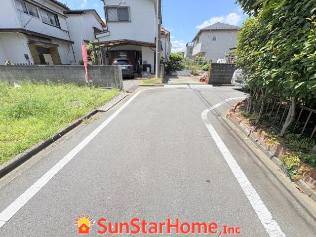 【サンスターホーム】西多摩郡瑞穂町むさし野　売地の前面道路含む現地写真